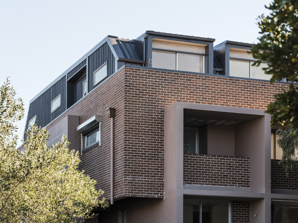 Corner and side elevation of the brick apartment building at 73 Gale Road, Maroubra